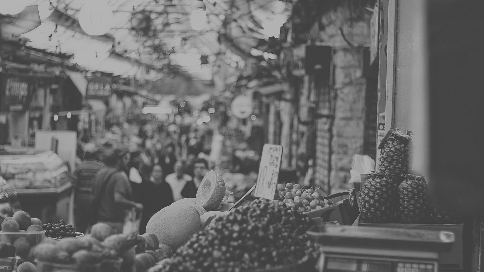 Black and white photo of a Reno street fair crowd downtown